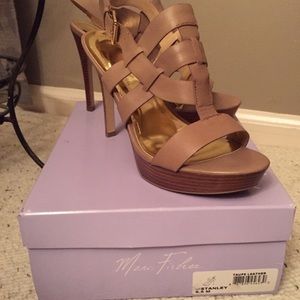 Strappy, slingback Marc Fisher high heel sandals.